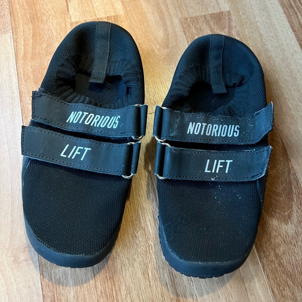 All black notorious lift gym slippers size 37 (women’s 7.5)